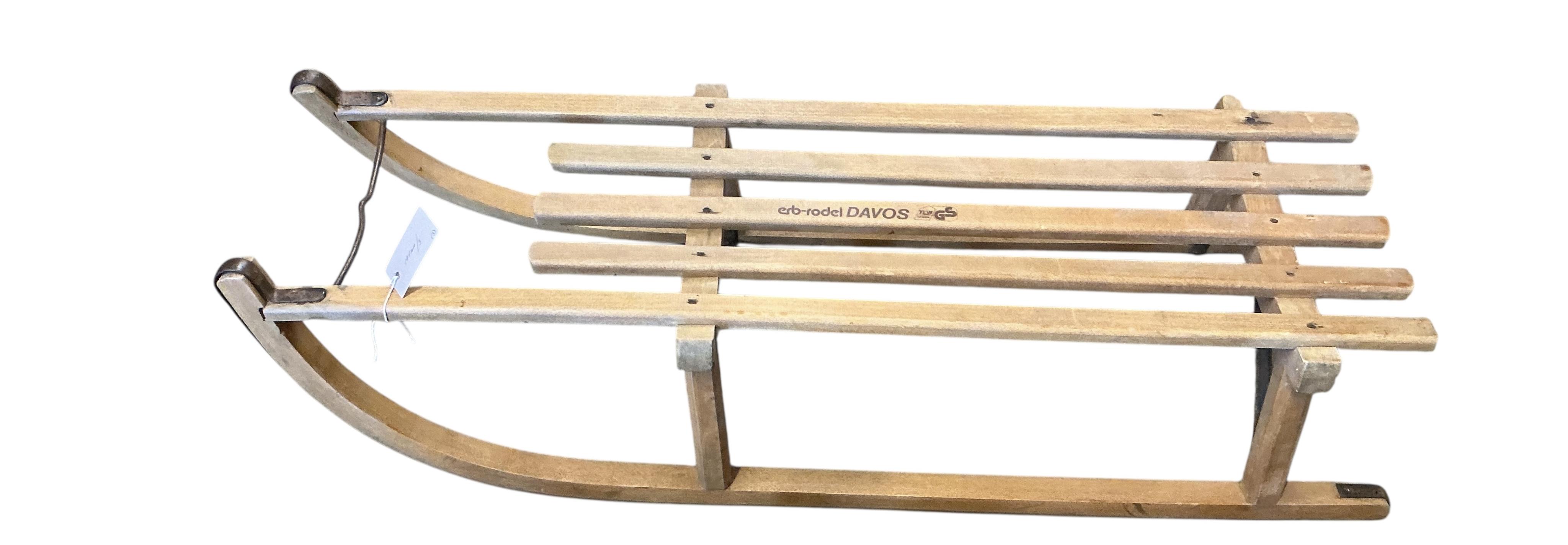 Three vintage Davos sledges